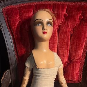 Very creepy haunted 1920s boudoir doll